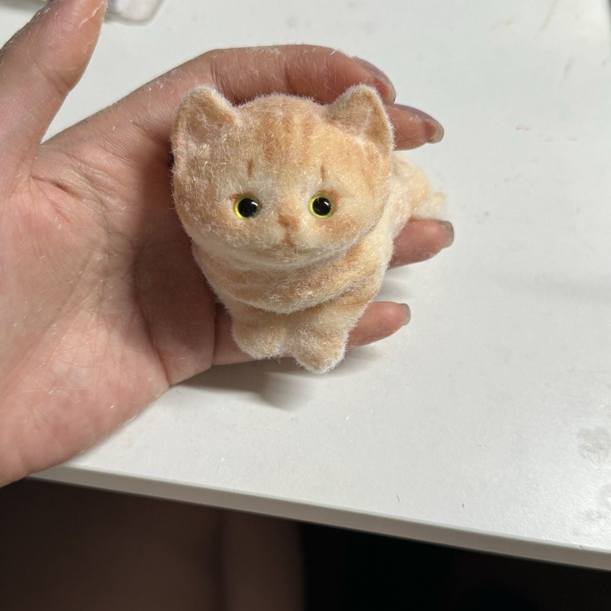 A000002: Cute simulation pinch kitten toy